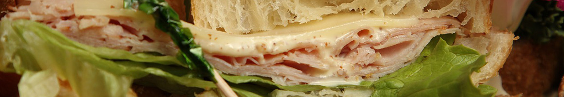 Eating Sandwich at Side Street Cafe Restaurant restaurant in Cockeysville, MD.